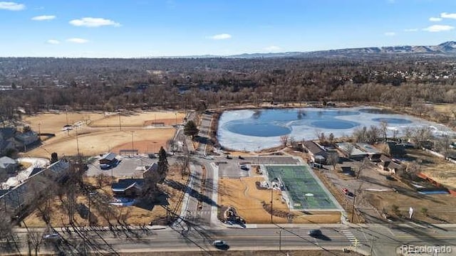 bird's eye view with a water view