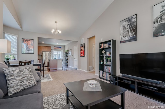 living area featuring light carpet, visible vents, baseboards, lofted ceiling, and an inviting chandelier