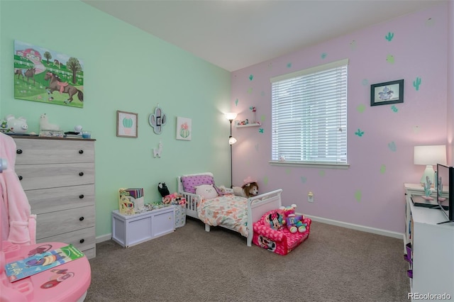 carpeted bedroom featuring baseboards