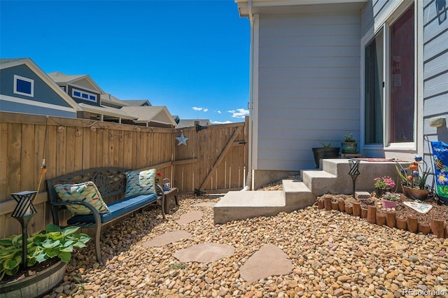 view of yard with a gate and fence