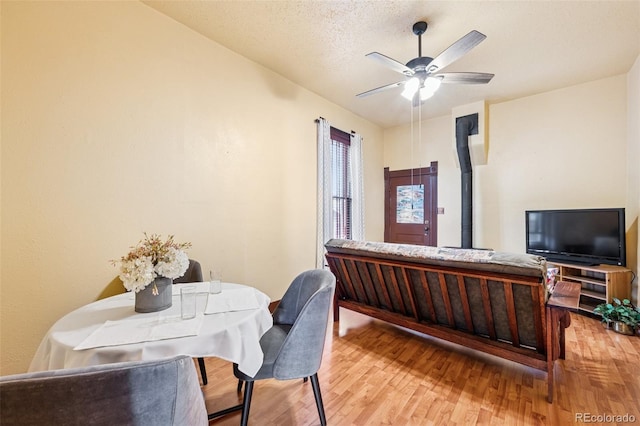 2119 W Pikes Peak Ave, Colorado Springs, CO 80904 - dining room featuring light wood-type flooring and a ceiling fan