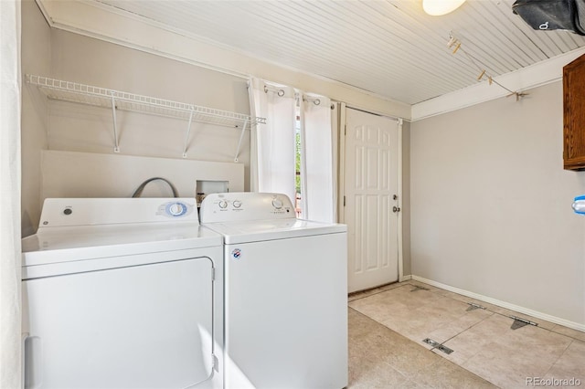 2119 W Pikes Peak Ave, Colorado Springs, CO 80904 - laundry room featuring washing machine and dryer, baseboards, and light tile patterned floors