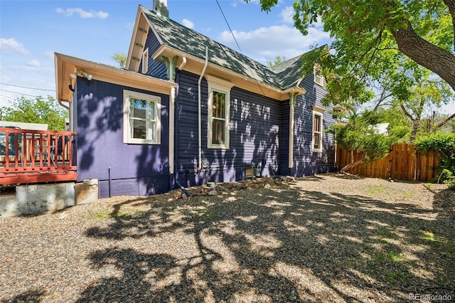 2119 W Pikes Peak Ave, Colorado Springs, CO 80904 - view of side of home featuring a deck