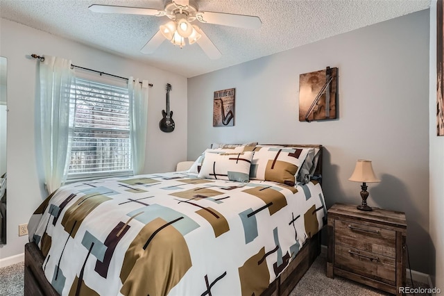 8101 S San Juan Range Rd, Littleton, CO 80127 - carpeted bedroom with a textured ceiling, ceiling fan, and baseboards