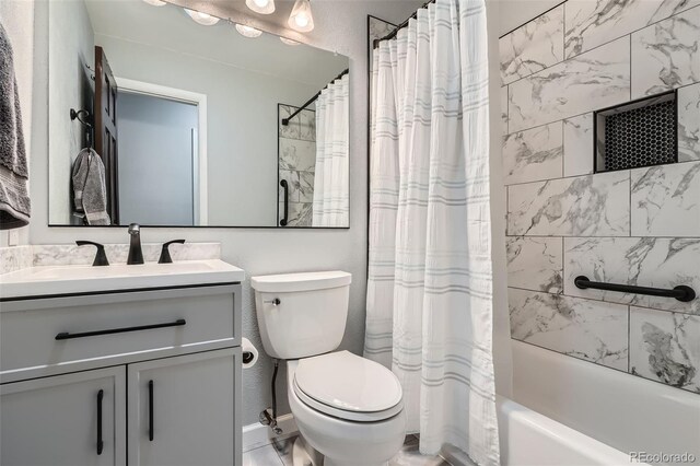 8101 S San Juan Range Rd, Littleton, CO 80127 - bathroom with toilet, vanity, and shower / tub combo with curtain