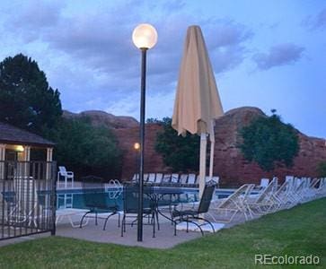 8101 S San Juan Range Rd, Littleton, CO 80127 - swimming pool with a patio