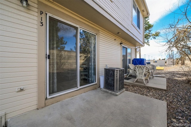 view of patio with central air condition unit