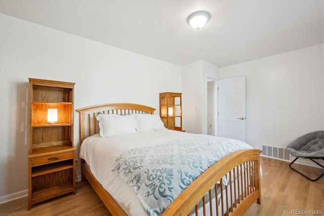 32392 Lodgepole Dr, Evergreen, CO 80439 - bedroom with wood finished floors