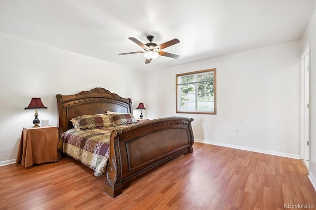 32392 Lodgepole Dr, Evergreen, CO 80439 - bedroom with light wood finished floors and a ceiling fan