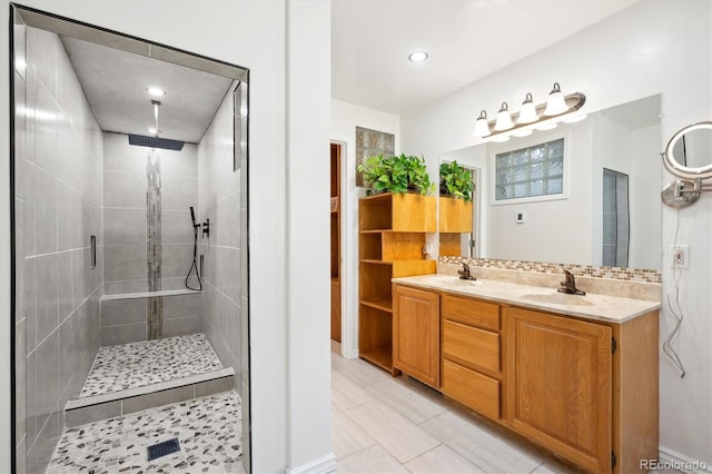 32392 Lodgepole Dr, Evergreen, CO 80439 - full bath with a tile shower, double vanity, tile patterned floors, and recessed lighting