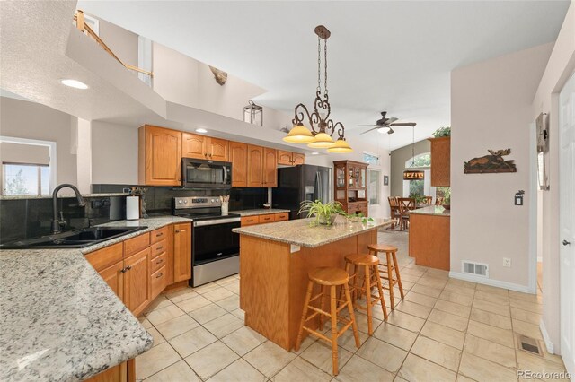 1044 Rangeview Dr, Black Hawk, CO 80422 - kitchen featuring black appliances, a sink, ceiling fan, decorative backsplash, and light tile patterned floors