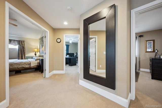 corridor featuring baseboards, carpet flooring, and recessed lighting