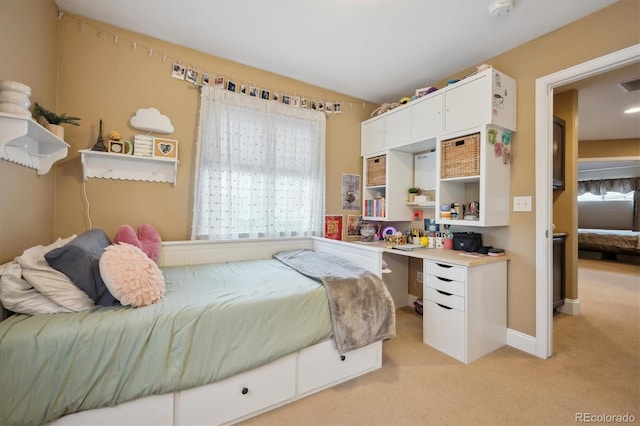 bedroom featuring light carpet, baseboards, and visible vents