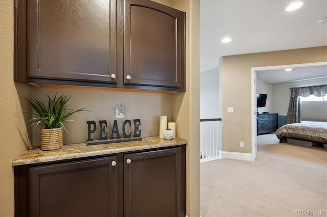 bar with recessed lighting, baseboards, and light colored carpet