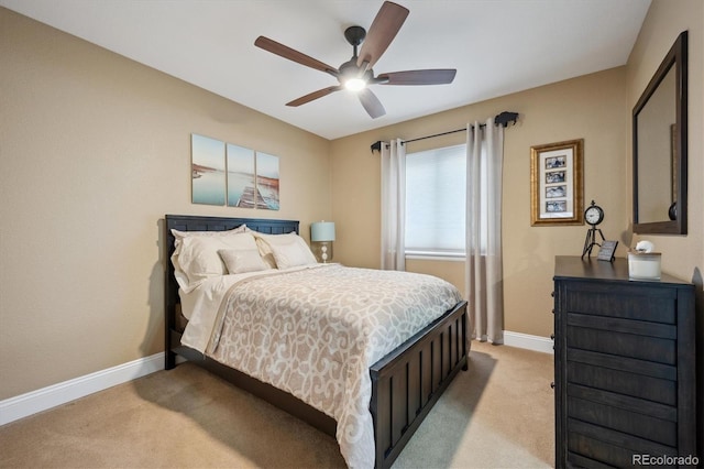 9882 S Hoyt Ct, Littleton, CO 80127 - bedroom featuring light colored carpet, baseboards, and ceiling fan