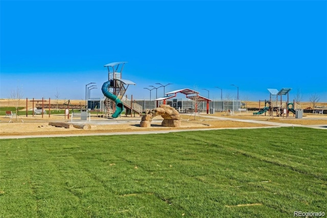 community play area with a yard