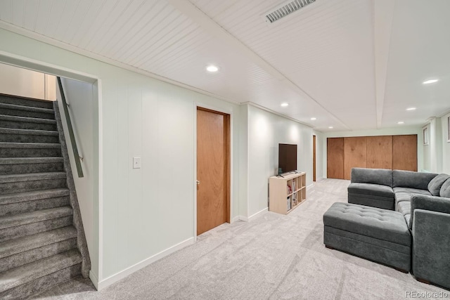 living room featuring light colored carpet