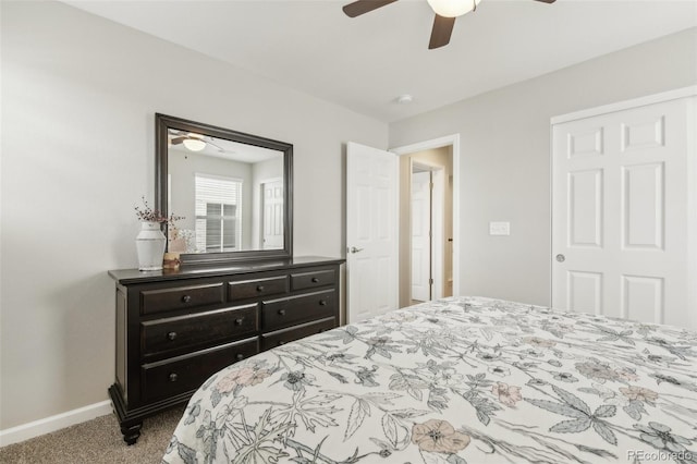 bedroom featuring light colored carpet and ceiling fan