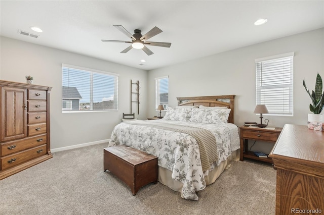 carpeted bedroom featuring ceiling fan