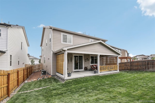 rear view of property with cooling unit, a fenced backyard, a lawn, and a patio