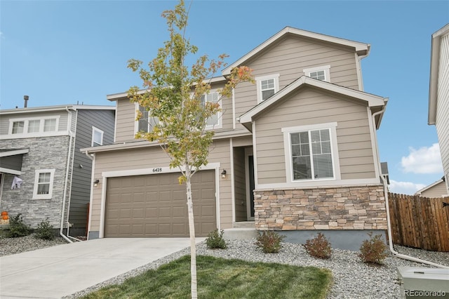 view of front of property with a garage