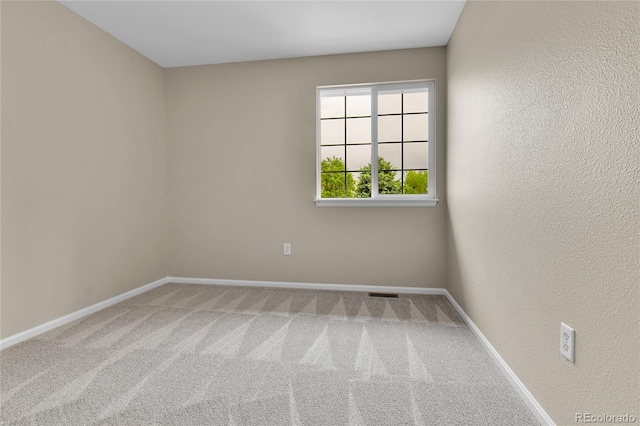 22974 E Dorado Dr, Aurora, CO 80015 - carpeted empty room with baseboards and a textured wall