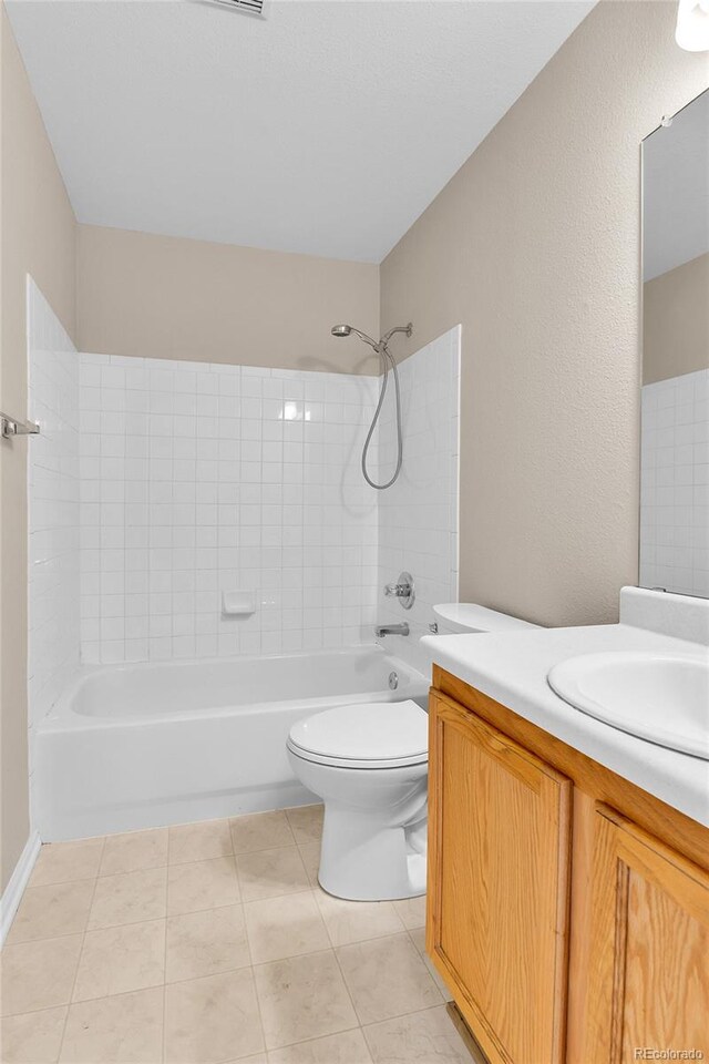 22974 E Dorado Dr, Aurora, CO 80015 - bathroom featuring vanity, shower / bathtub combination, toilet, and tile patterned flooring
