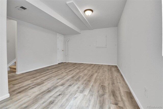 22974 E Dorado Dr, Aurora, CO 80015 - spare room with light wood finished floors, baseboards, and stairway