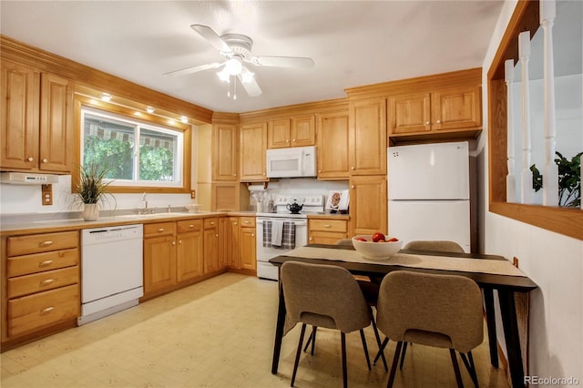 7839 Florado St, Denver, CO 80221 - kitchen with white appliances, ceiling fan, light flooring, and light countertops