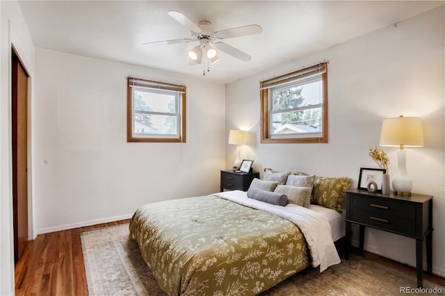 7839 Florado St, Denver, CO 80221 - bedroom featuring wood finished floors, a closet, and ceiling fan