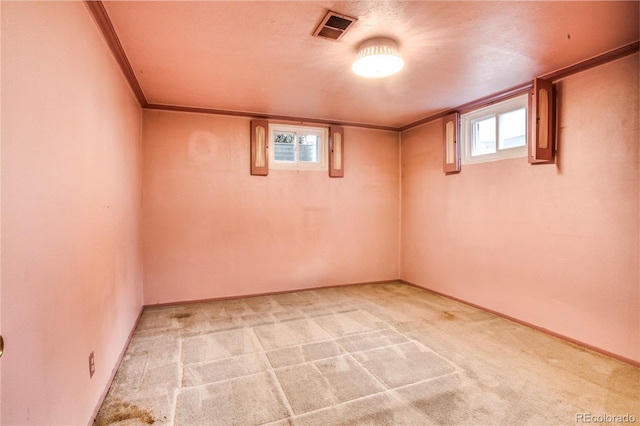 7839 Florado St, Denver, CO 80221 - below grade area featuring light colored carpet and plenty of natural light