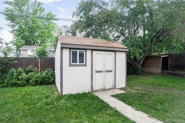 7839 Florado St, Denver, CO 80221 - view of shed featuring a fenced backyard