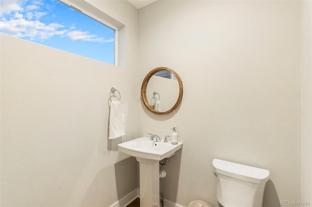 bathroom featuring toilet