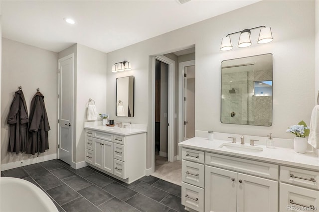 bathroom featuring vanity, walk in shower, and tile patterned flooring