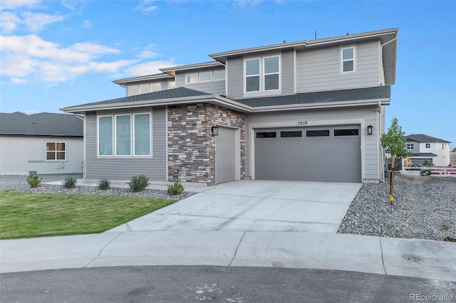 view of front of property with a garage