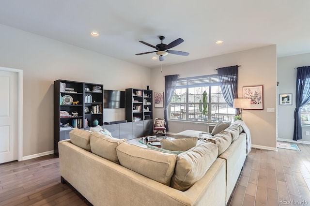 15855 Wild Horse Dr, Broomfield, CO 80023 - living area featuring recessed lighting, wood finished floors, baseboards, and ceiling fan