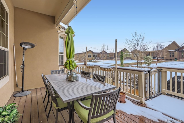 15855 Wild Horse Dr, Broomfield, CO 80023 - snow covered deck featuring a residential view and outdoor dining area