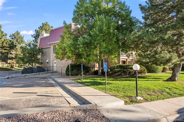 exterior space featuring a lawn