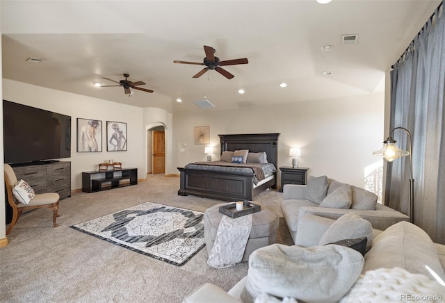 bedroom with ceiling fan and light colored carpet