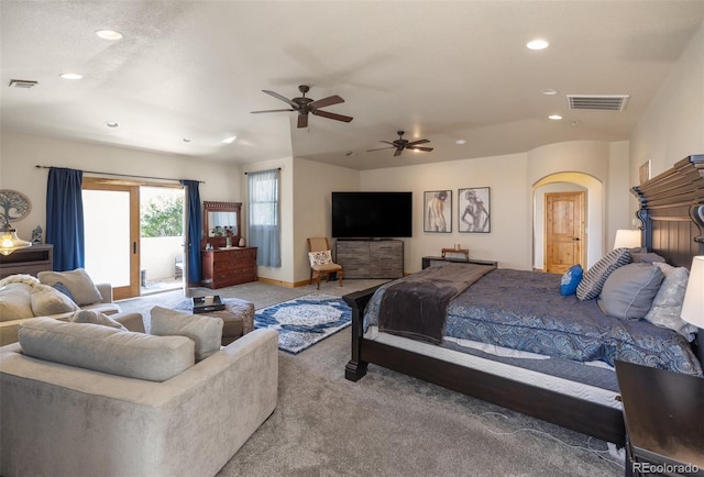 carpeted bedroom with ceiling fan and access to exterior