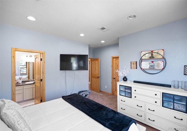 10215 W Wesley Dr, Lakewood, CO 80227 - bedroom featuring connected bathroom, a sink, light carpet, visible vents, and recessed lighting
