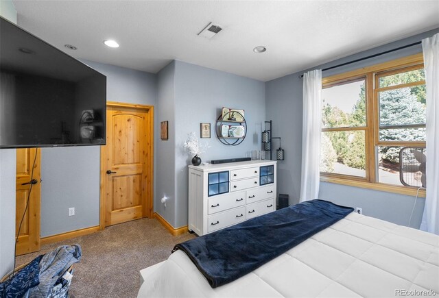 10215 W Wesley Dr, Lakewood, CO 80227 - carpeted bedroom featuring baseboards, visible vents, and recessed lighting