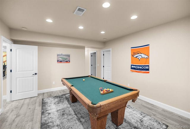 game room with hardwood / wood-style floors and billiards