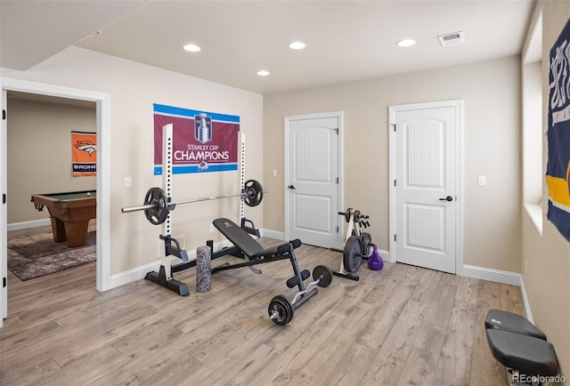 workout area with pool table and light hardwood / wood-style floors