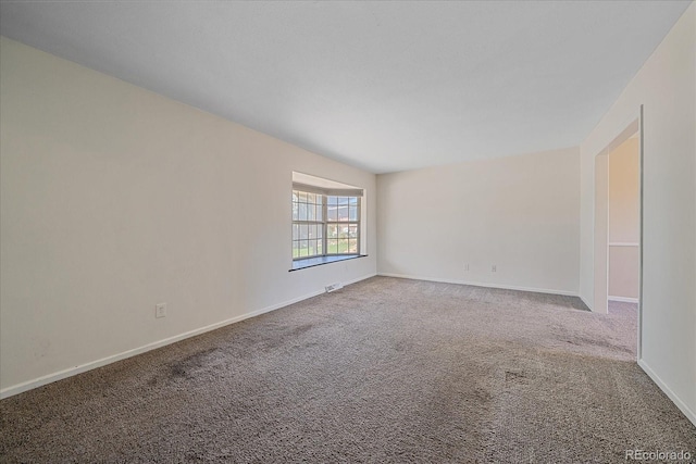 1923 S Newark Way, Aurora, CO 80014 - unfurnished room featuring carpet flooring