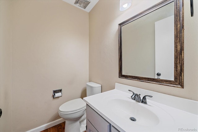 1923 S Newark Way, Aurora, CO 80014 - half bath featuring vanity and wood finished floors