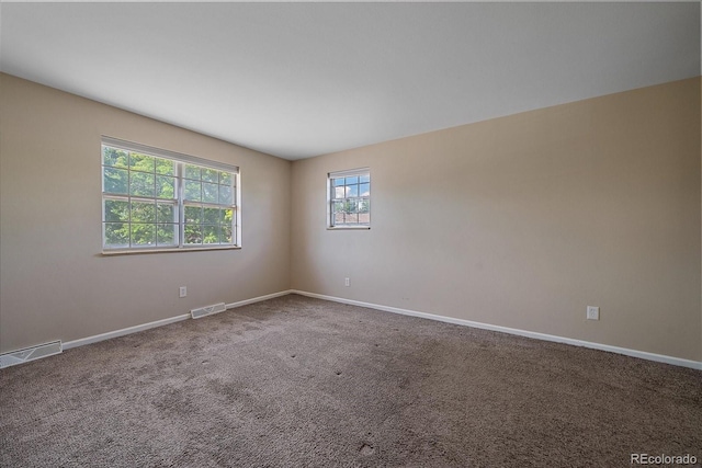 1923 S Newark Way, Aurora, CO 80014 - unfurnished room featuring baseboards and carpet