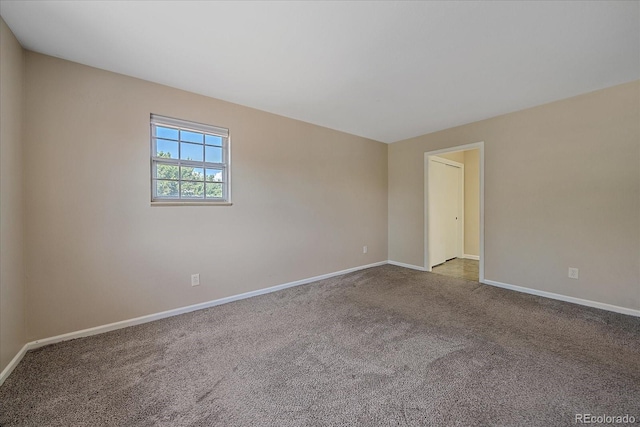 1923 S Newark Way, Aurora, CO 80014 - carpeted empty room featuring baseboards