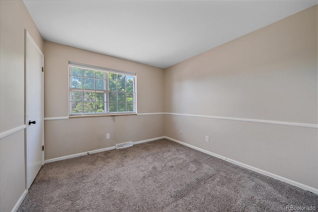 1923 S Newark Way, Aurora, CO 80014 - carpeted spare room featuring baseboards