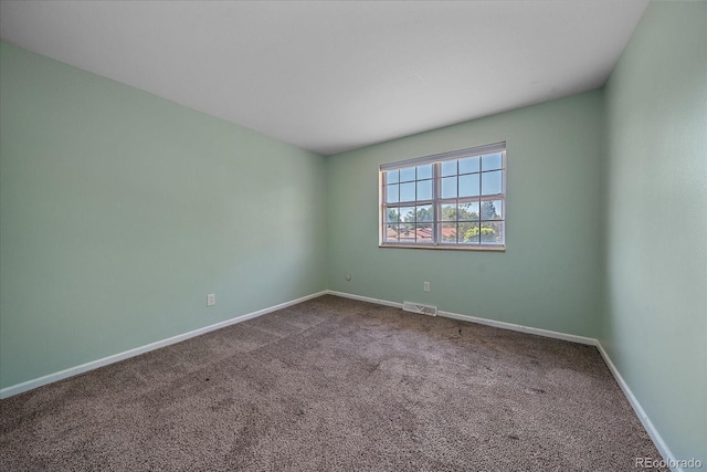 1923 S Newark Way, Aurora, CO 80014 - carpeted empty room with baseboards